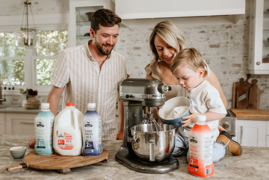 mom, dad, and son baking using Walker Farms milk